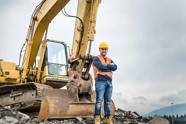 Heavy equipment operator handling construction machinery
